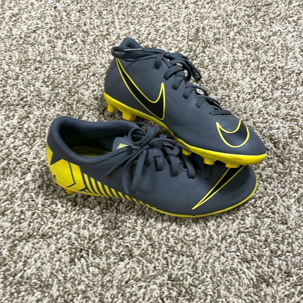 Yellow and gold soccer cleats
